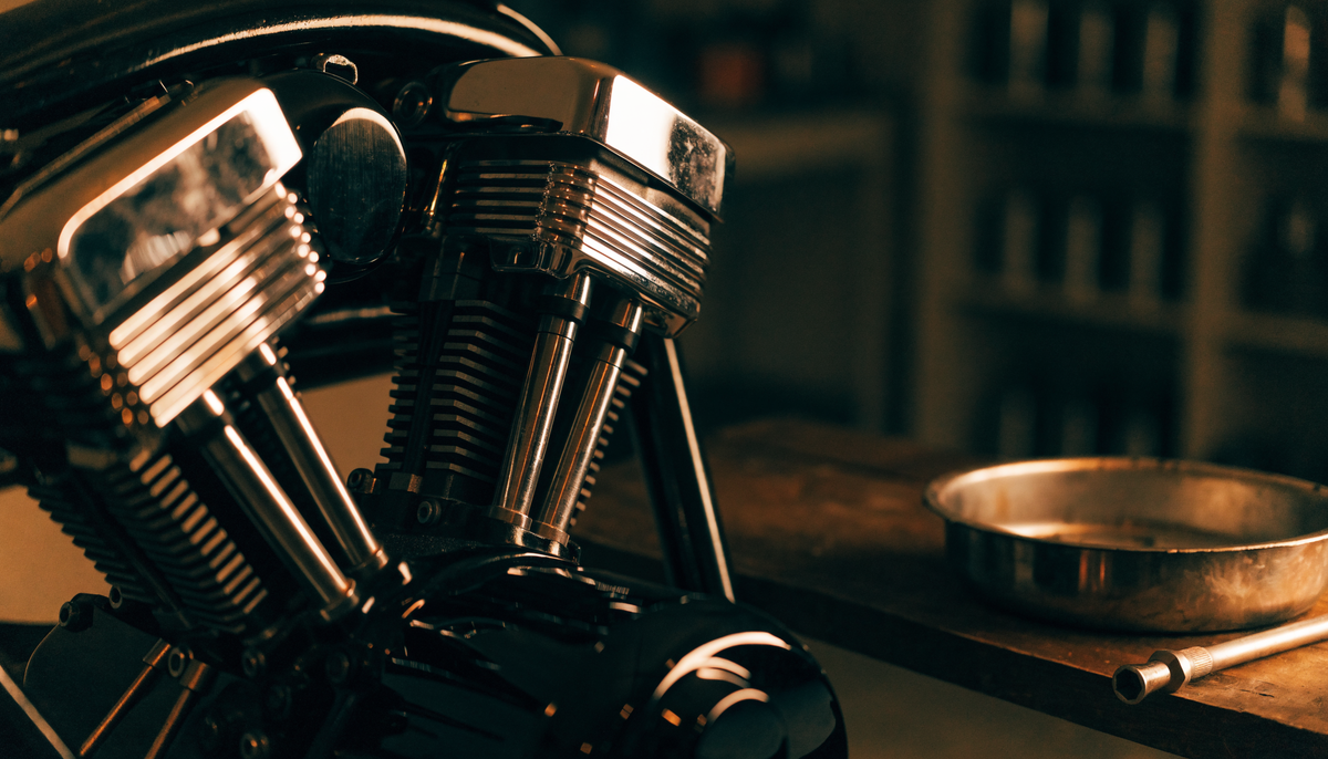 V-twin engine on the bench in a warm workshop
